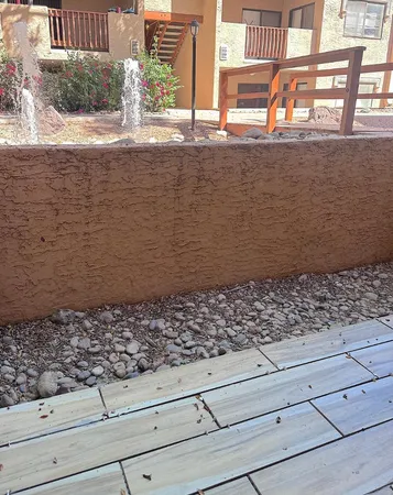 a view of water heater and wooden floor
