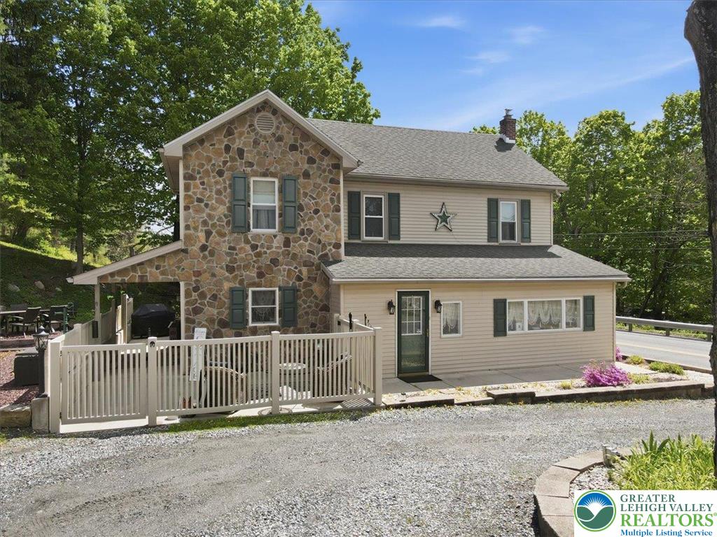 4880 Little Gap Road Kunkletown, PA 18058 - Photo 4 of 100 This charming home features a captivating stone and siding exterior, offering comfort and enduring appeal.