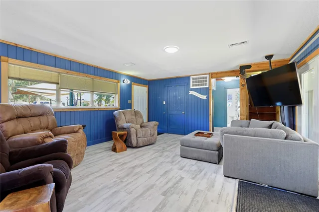 a kitchen with sink and cabinets