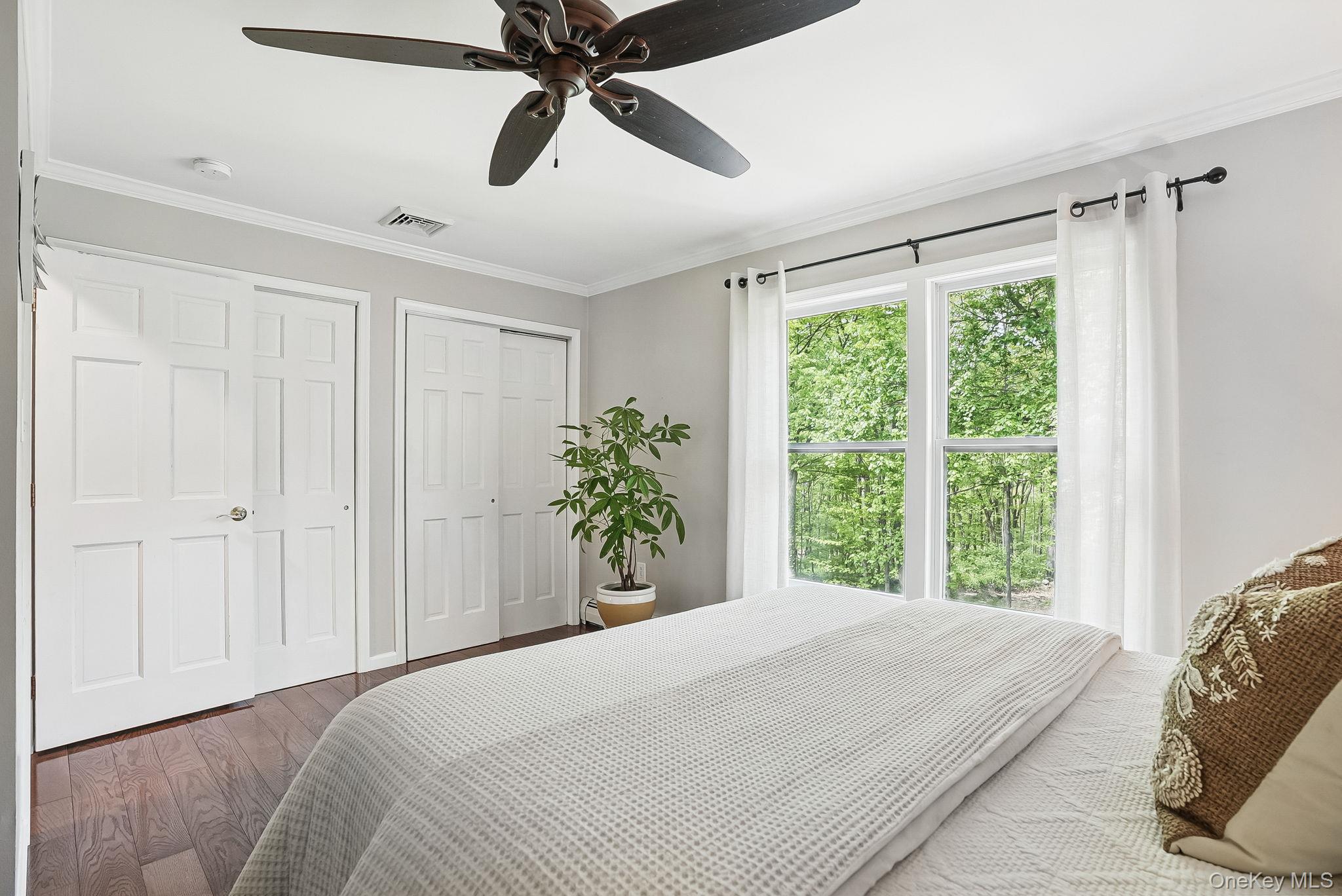 304 Church Road Putnam Valley, NY 10579 - Photo 23 of 50 Bedroom featuring wood finished floors, ornamental molding, and ceiling fan