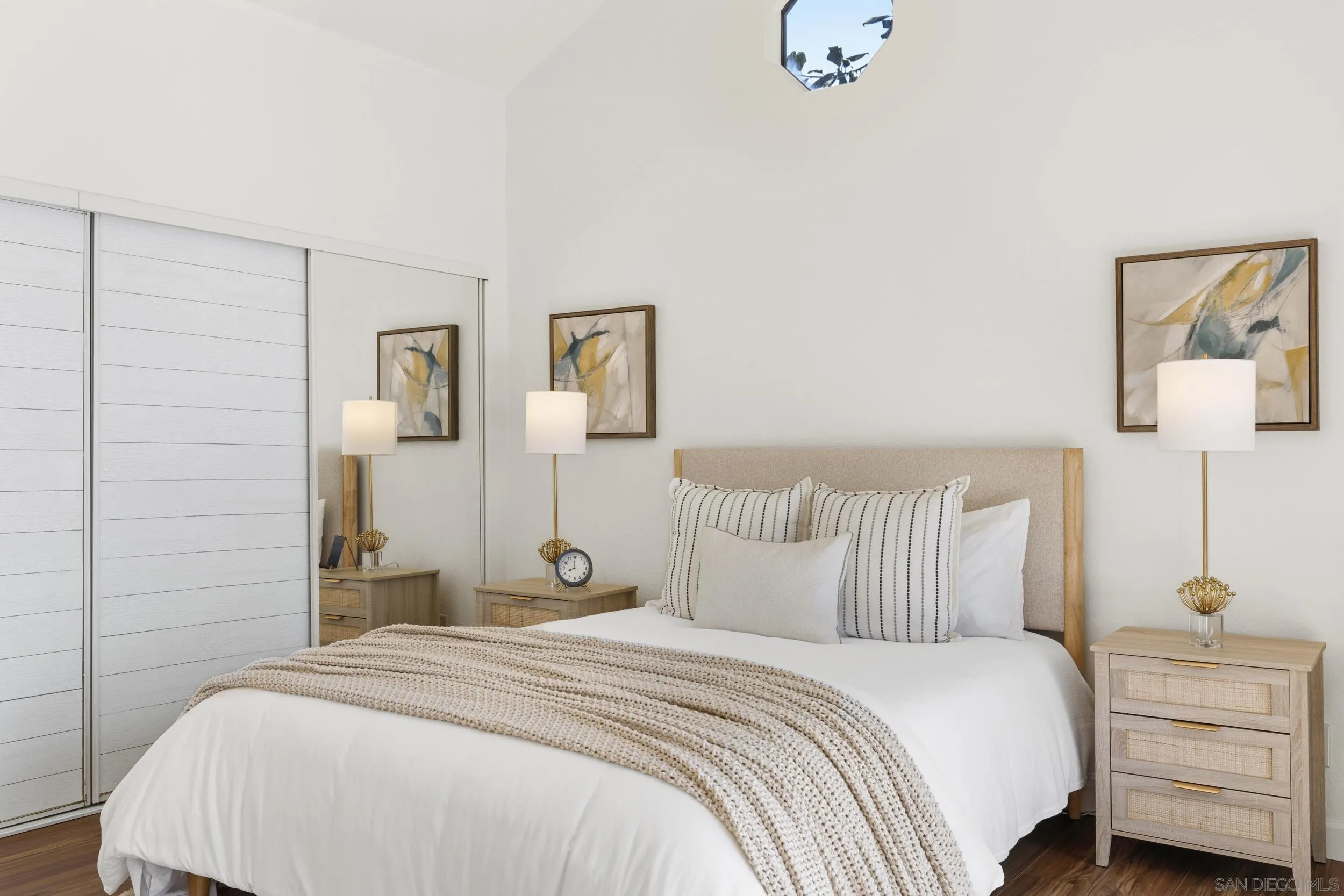 863 Violet Court Carlsbad, CA 92011 - Photo 17 of 37 a bedroom with a bed and a night stand