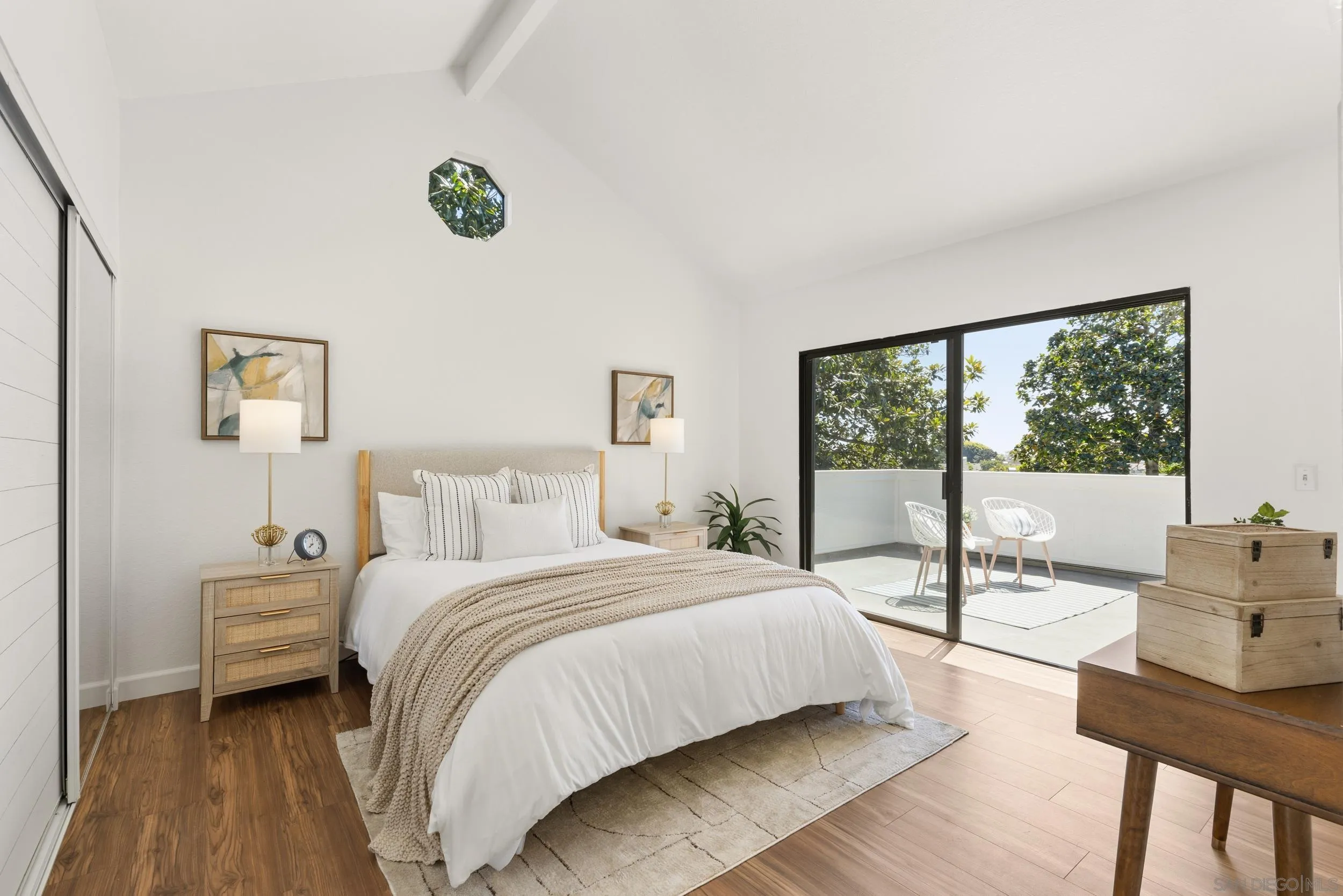 863 Violet Court Carlsbad, CA 92011 - Photo 18 of 37 a bedroom with a bed and a large window