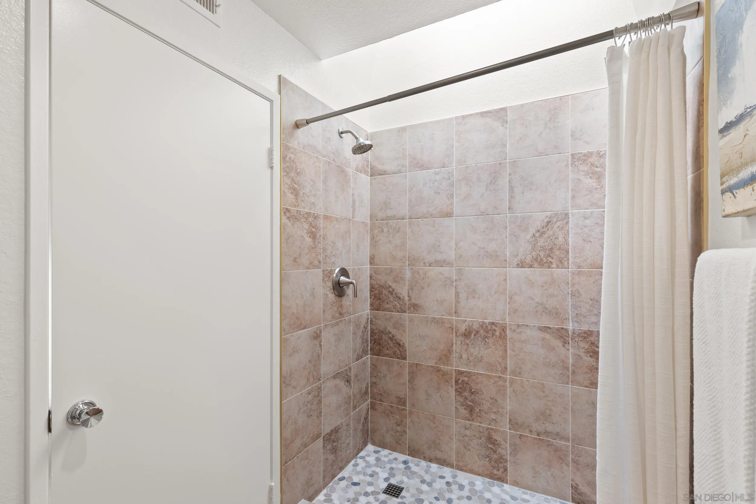 863 Violet Court Carlsbad, CA 92011 - Photo 21 of 37 a bathroom with a shower