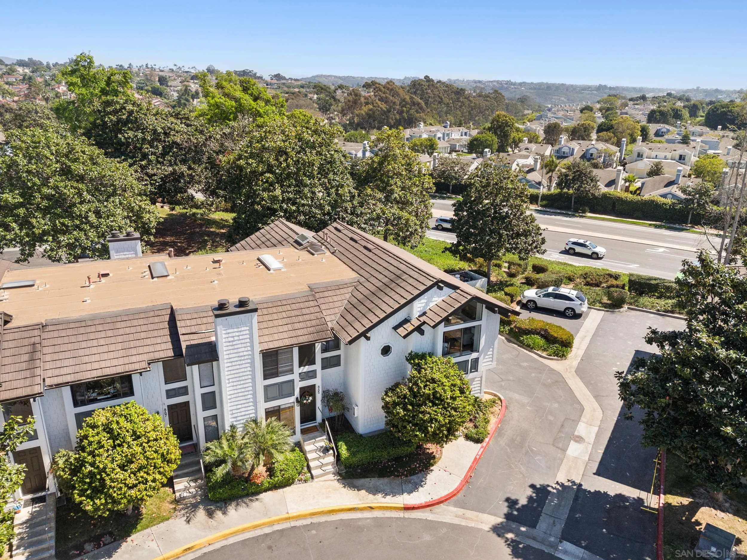 863 Violet Court Carlsbad, CA 92011 - Photo 27 of 37 an aerial view of a house with a yard and lake view
