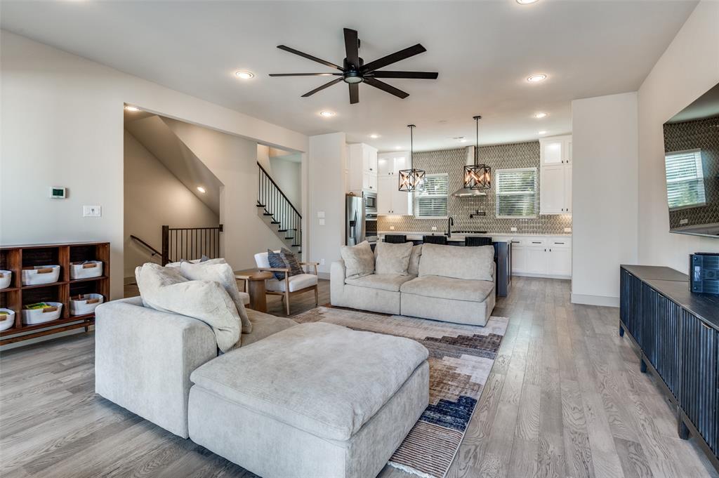 1434 Elevado Drive Dallas, TX 75212 - Photo 13 of 27 a living room with furniture and kitchen view
