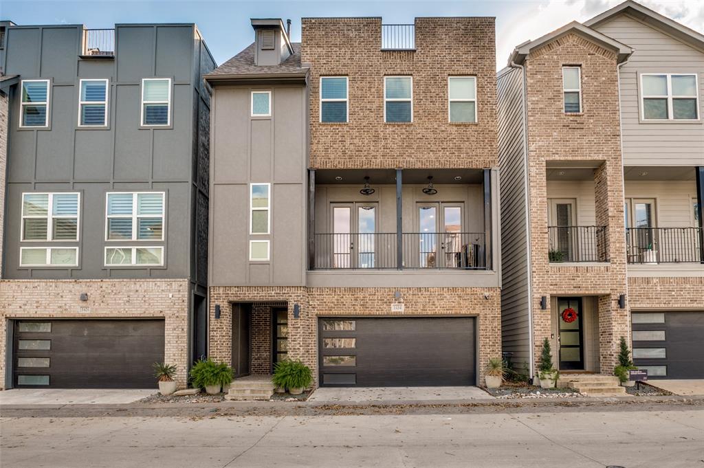 1434 Elevado Drive Dallas, TX 75212 - Photo 3 of 27 a front view of a building with a garden