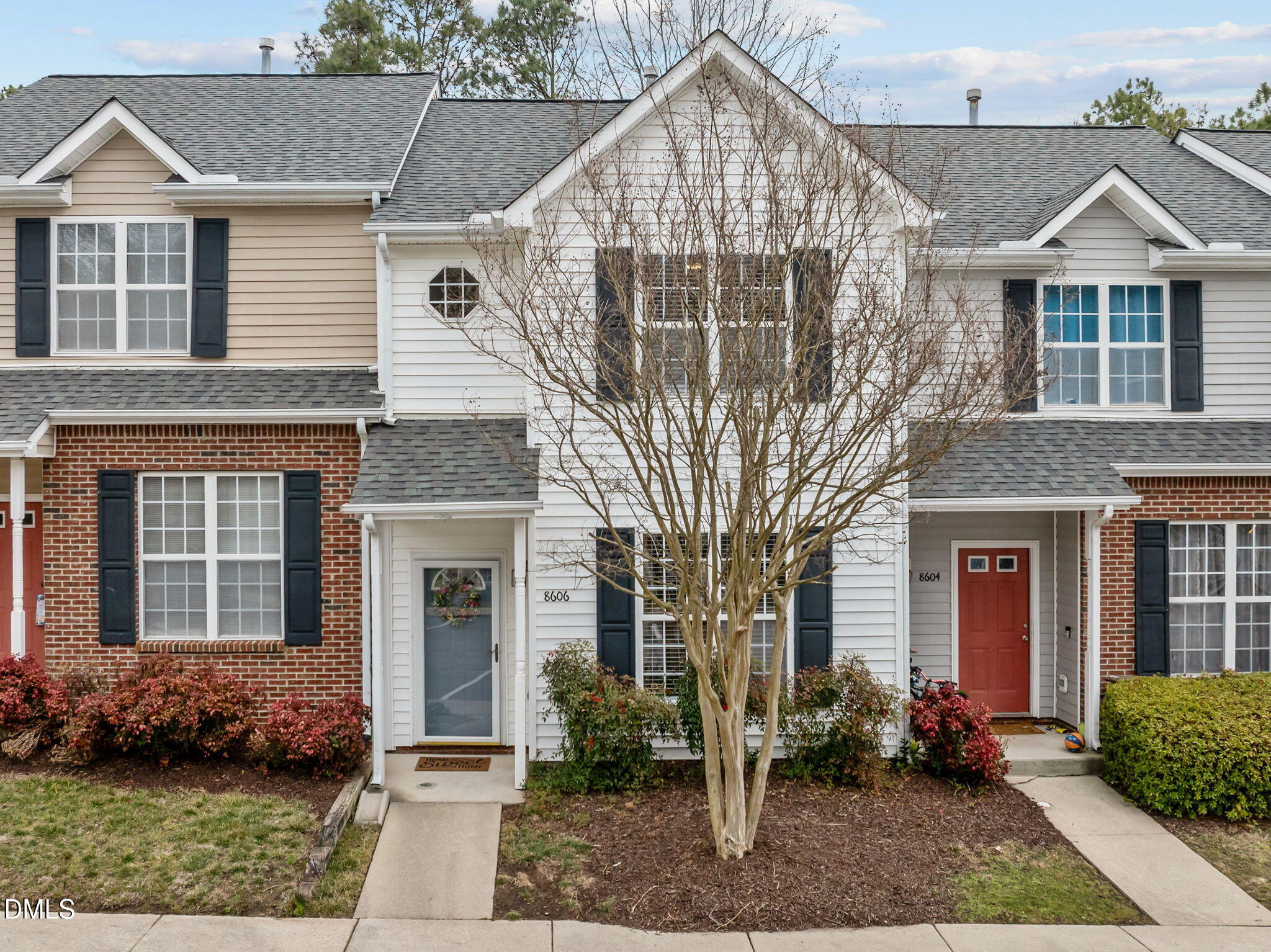 8606 London Park Court Raleigh, NC 27615 - Photo 1 of 29 a front view of a house with garden