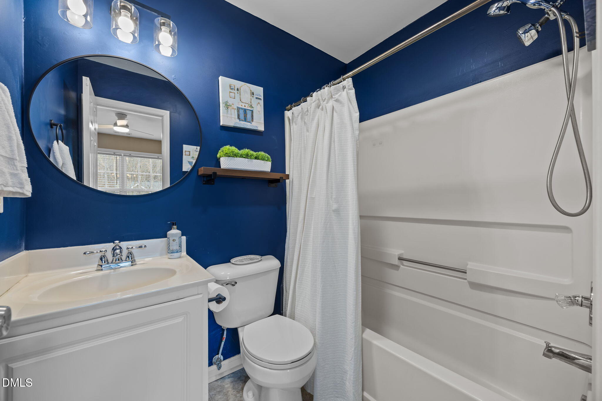 8606 London Park Court Raleigh, NC 27615 - Photo 17 of 29 a bathroom with a toilet and a shower