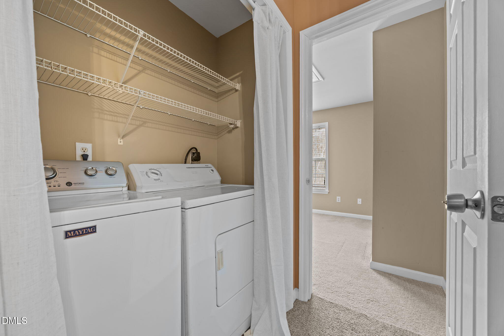 8606 London Park Court Raleigh, NC 27615 - Photo 19 of 29 a utility room with dryer and washer