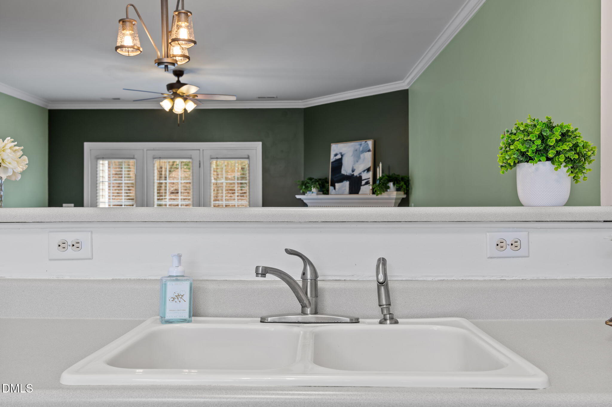 8606 London Park Court Raleigh, NC 27615 - Photo 8 of 29 a bathroom with a sink and a mirror