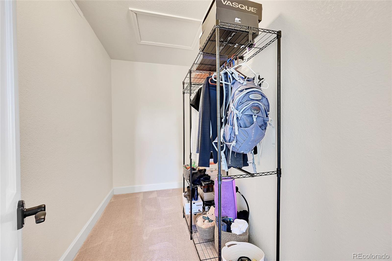 8717 Thunderbird Circle Parker, CO 80134 - Photo 30 of 50 a view of a room with rack on the wall