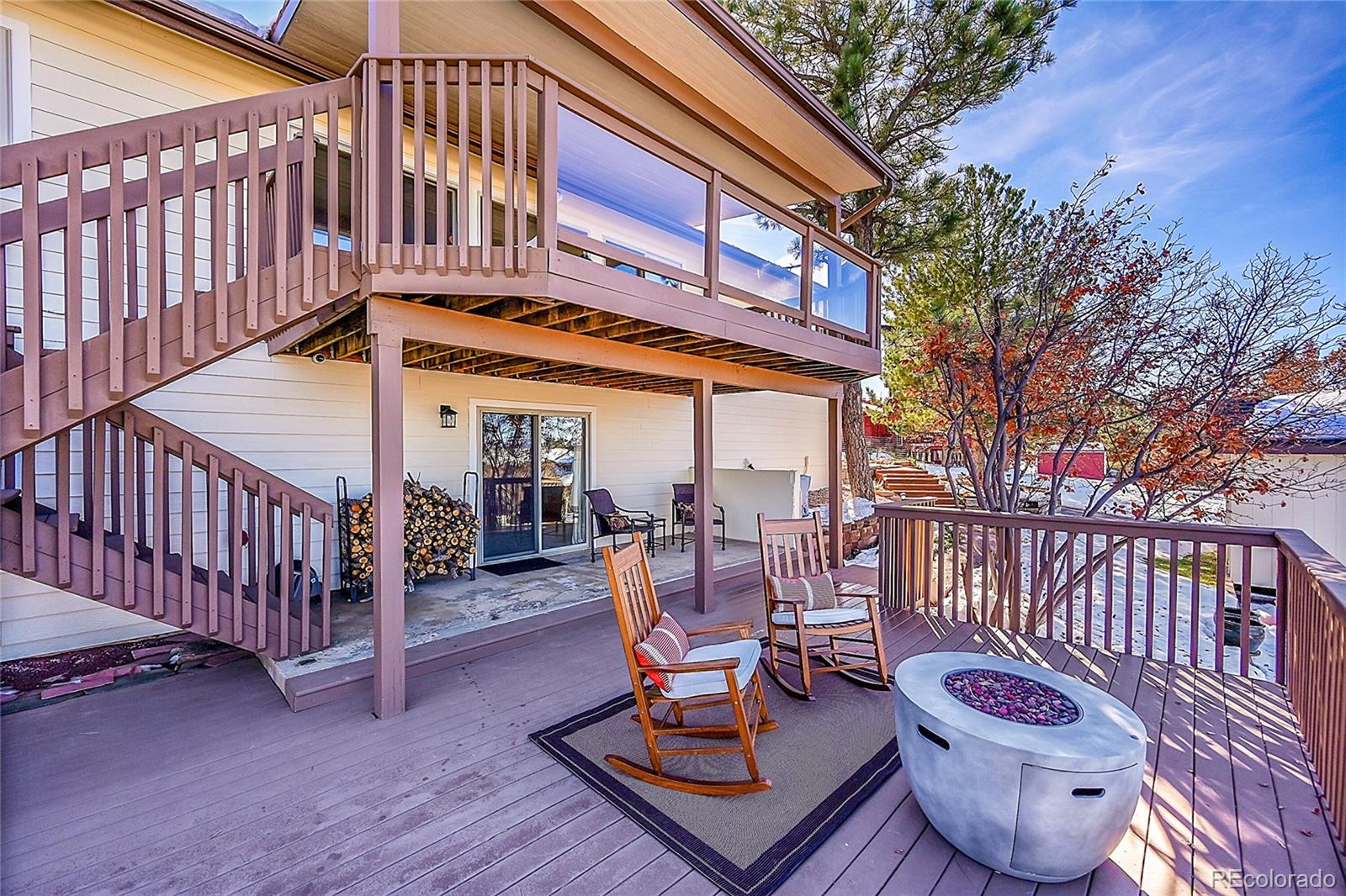8717 Thunderbird Circle Parker, CO 80134 - Photo 43 of 50 a view of a patio with a table and chairs