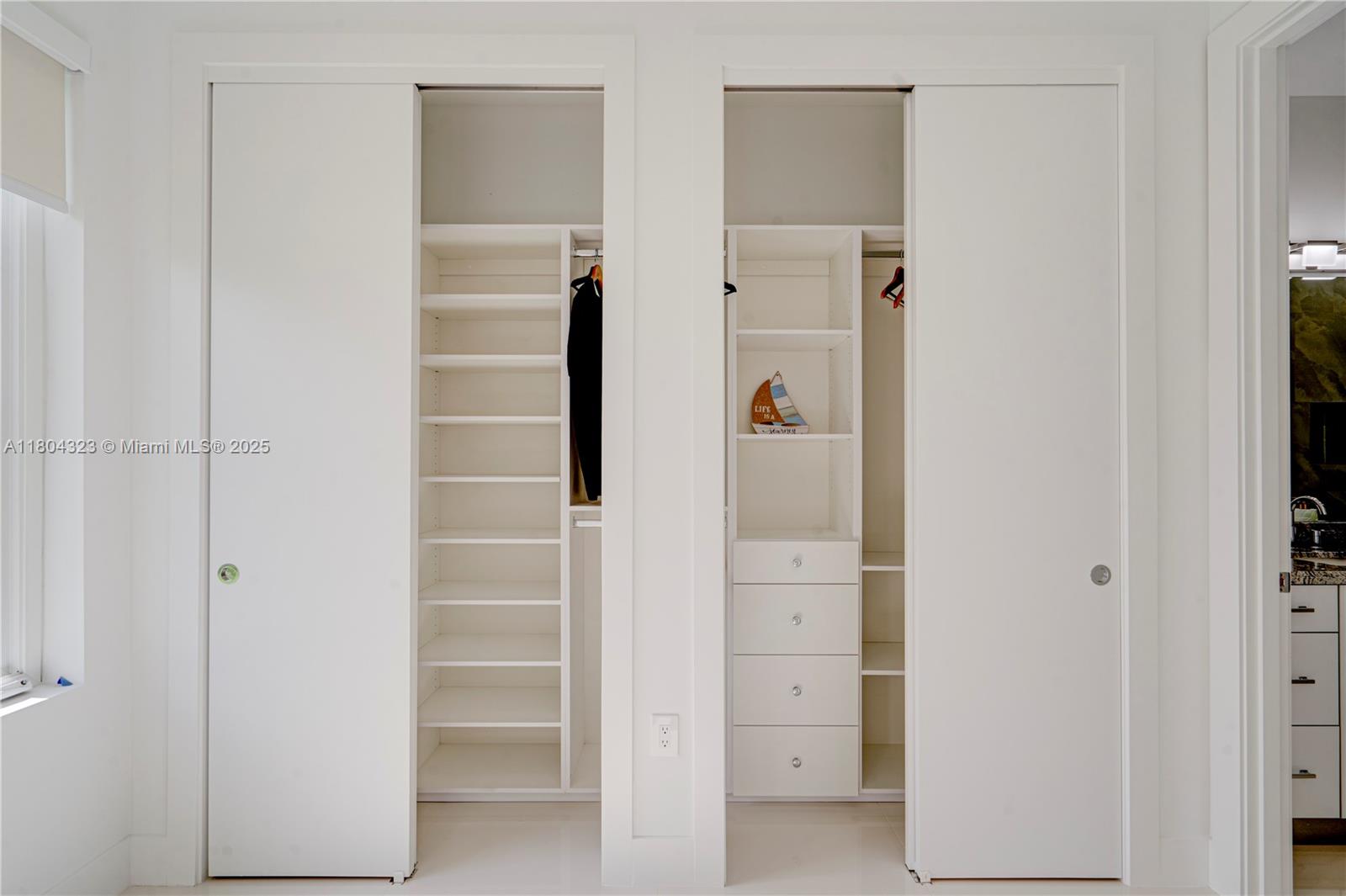 1805 Northwest 22nd Court Miami, FL 33125 - Photo 23 of 58 a room with walk in closet and closet