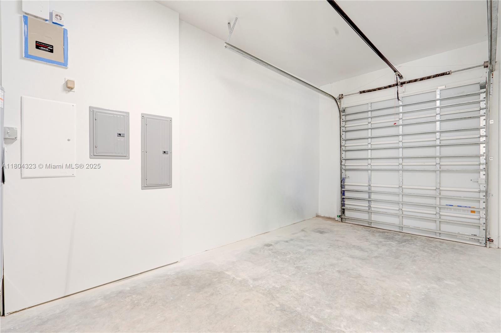 1805 Northwest 22nd Court Miami, FL 33125 - Photo 30 of 58 Private garage with Wi-Fi operated garage door