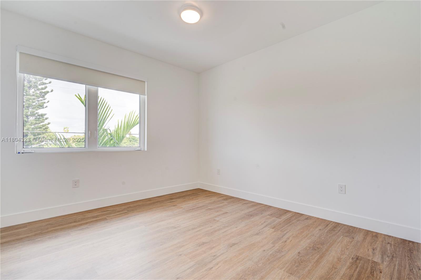 1805 Northwest 22nd Court Miami, FL 33125 - Photo 54 of 58 an empty room with a window