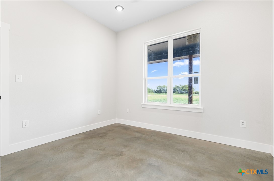 237 Cedar Bluff Loop Gatesville, TX 76528 - Photo 18 of 31 an empty room with a window