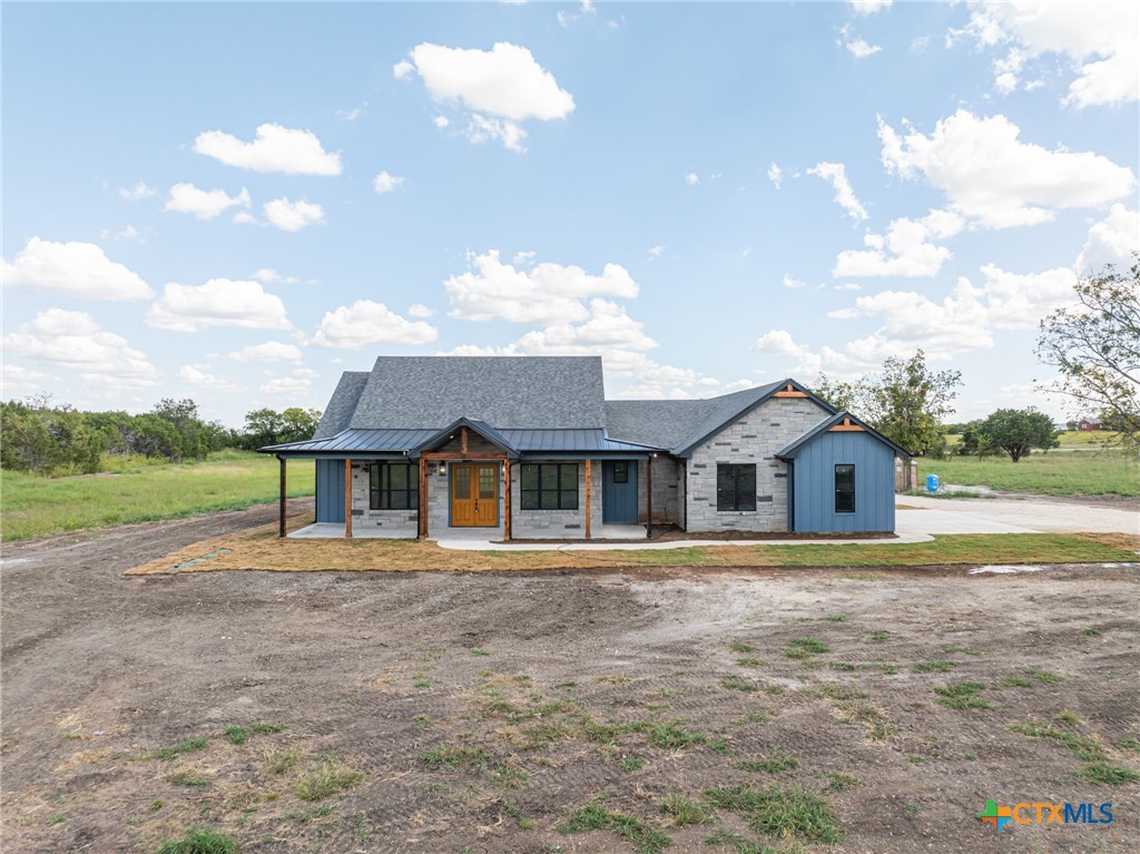 237 Cedar Bluff Loop Gatesville, TX 76528 - Photo 25 of 31 a front view of a house with a yard