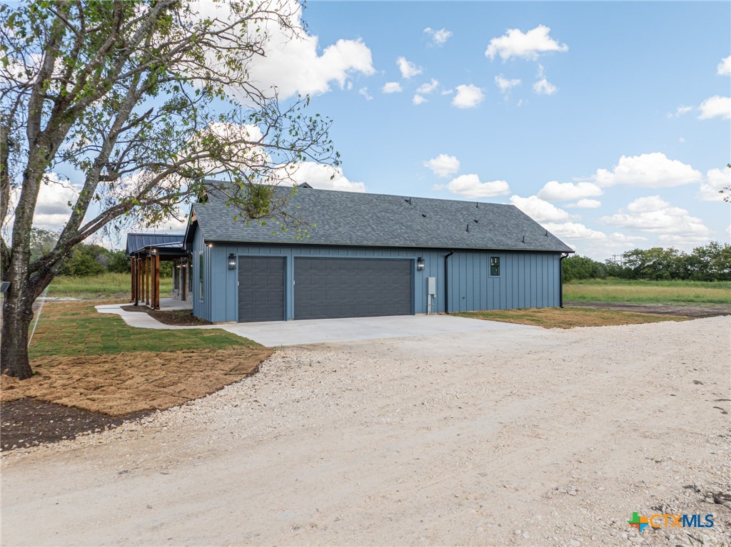 237 Cedar Bluff Loop Gatesville, TX 76528 - Photo 26 of 31 a front view of a house with a yard and garage