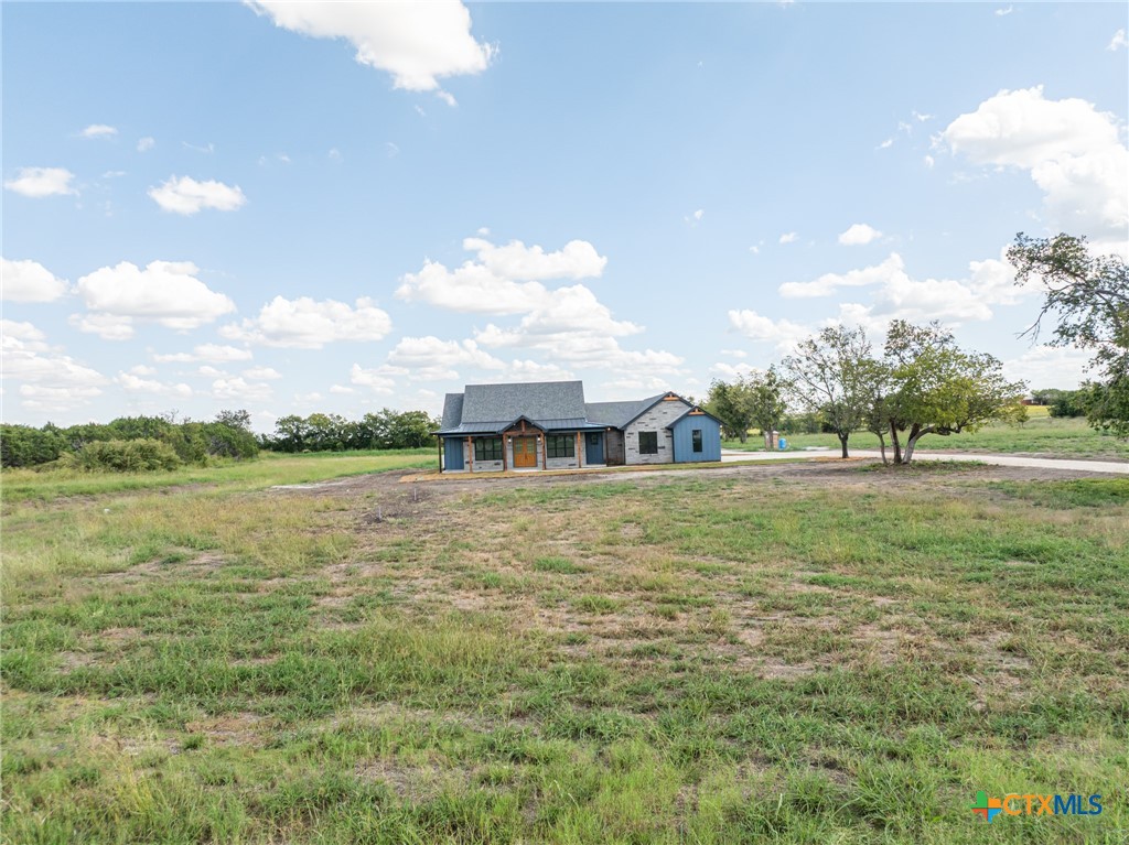 237 Cedar Bluff Loop Gatesville, TX 76528 - Photo 30 of 31 a front view of a house with a yard