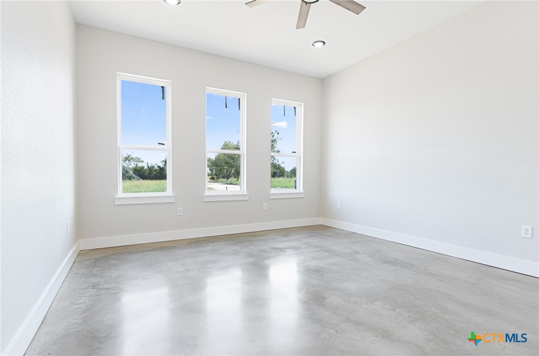 237 Cedar Bluff Loop Gatesville, TX 76528 - Photo 10 of 31 an empty room with windows