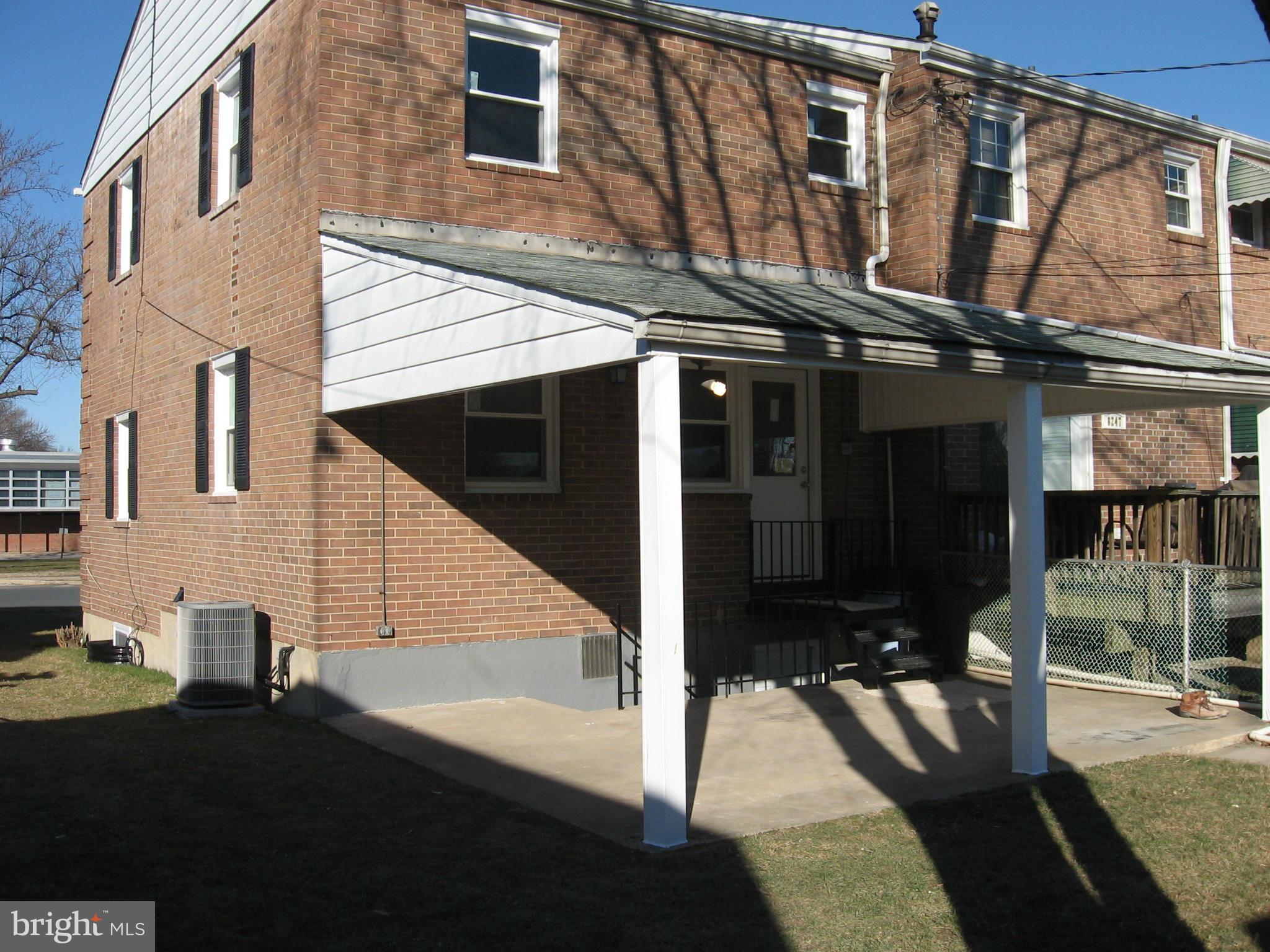 8245 Del Haven Road Baltimore, MD 21222 - Photo 27 of 29 a view of a house with a door