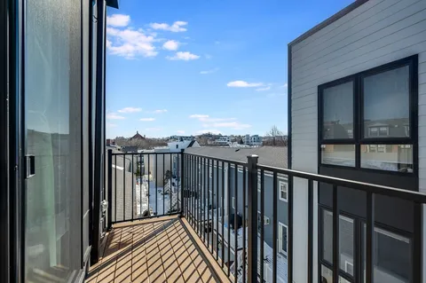 a view of a balcony with city view