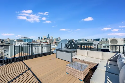 a view of a terrace with seating space