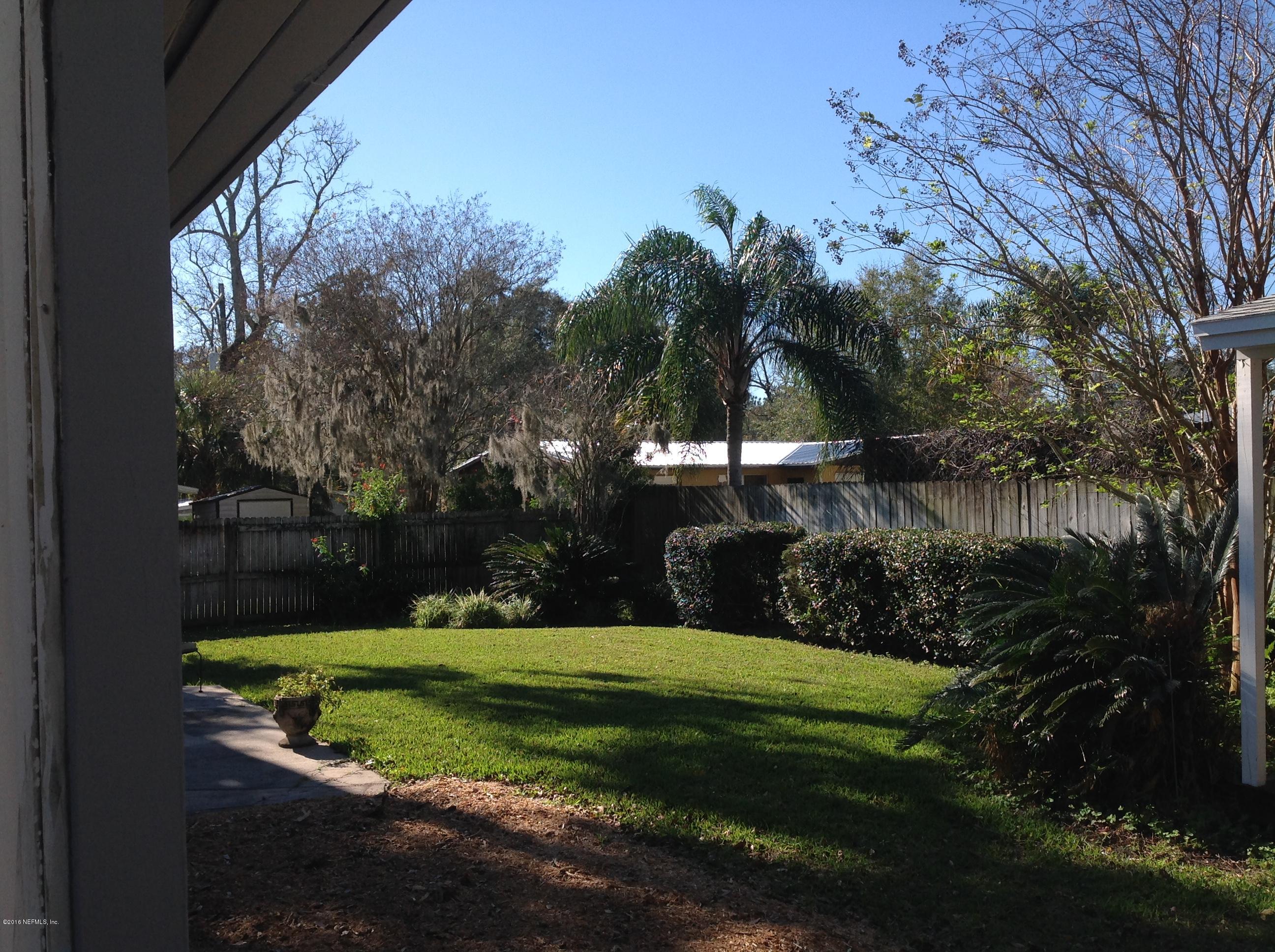 6426 Wesleyan Road Jacksonville, FL 32217 - Photo 4 of 4 a view of a park with large trees