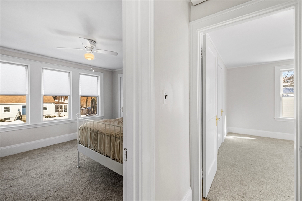 34 Lafayette Street Marblehead, MA 01945 - Photo 14 of 22 a view of a bedroom with window and walk in closet