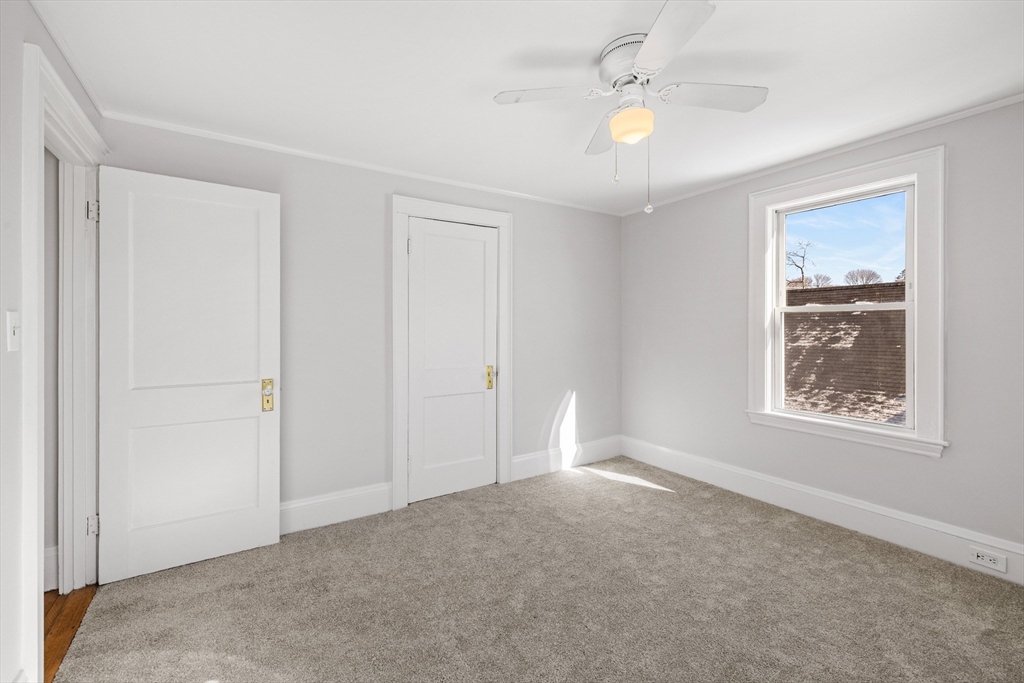 34 Lafayette Street Marblehead, MA 01945 - Photo 19 of 22 a view of an empty room with a window