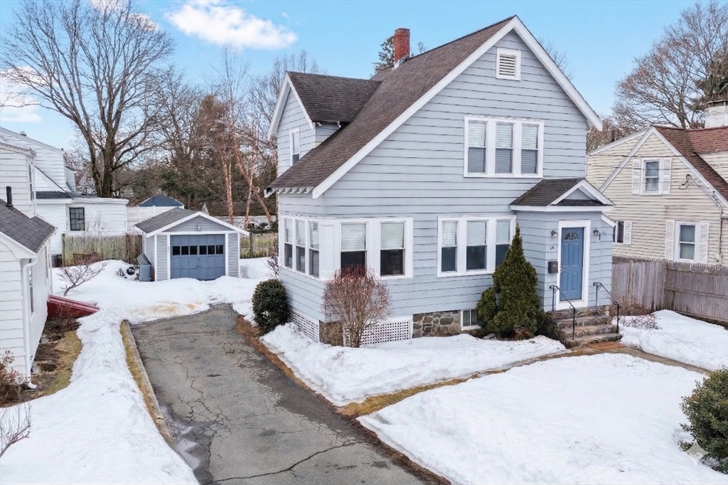 34 Lafayette Street Marblehead, MA 01945 - Photo 20 of 22 a front view of a house with a yard
