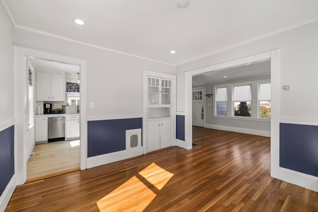 34 Lafayette Street Marblehead, MA 01945 - Photo 7 of 22 a open kitchen with cabinets and wooden floor