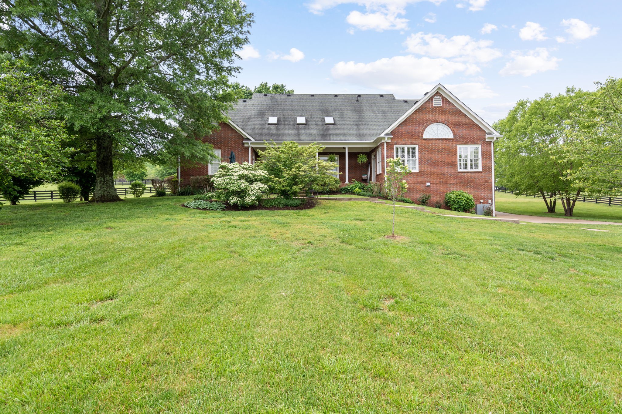 3210 Kinnard Springs Road Franklin, TN 37064 - Photo 50 of 64 a front view of a house with a yard