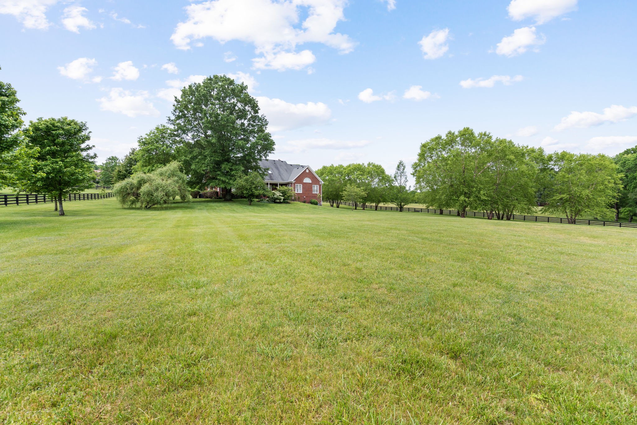 3210 Kinnard Springs Road Franklin, TN 37064 - Photo 51 of 64 a view of a field with an trees in the background