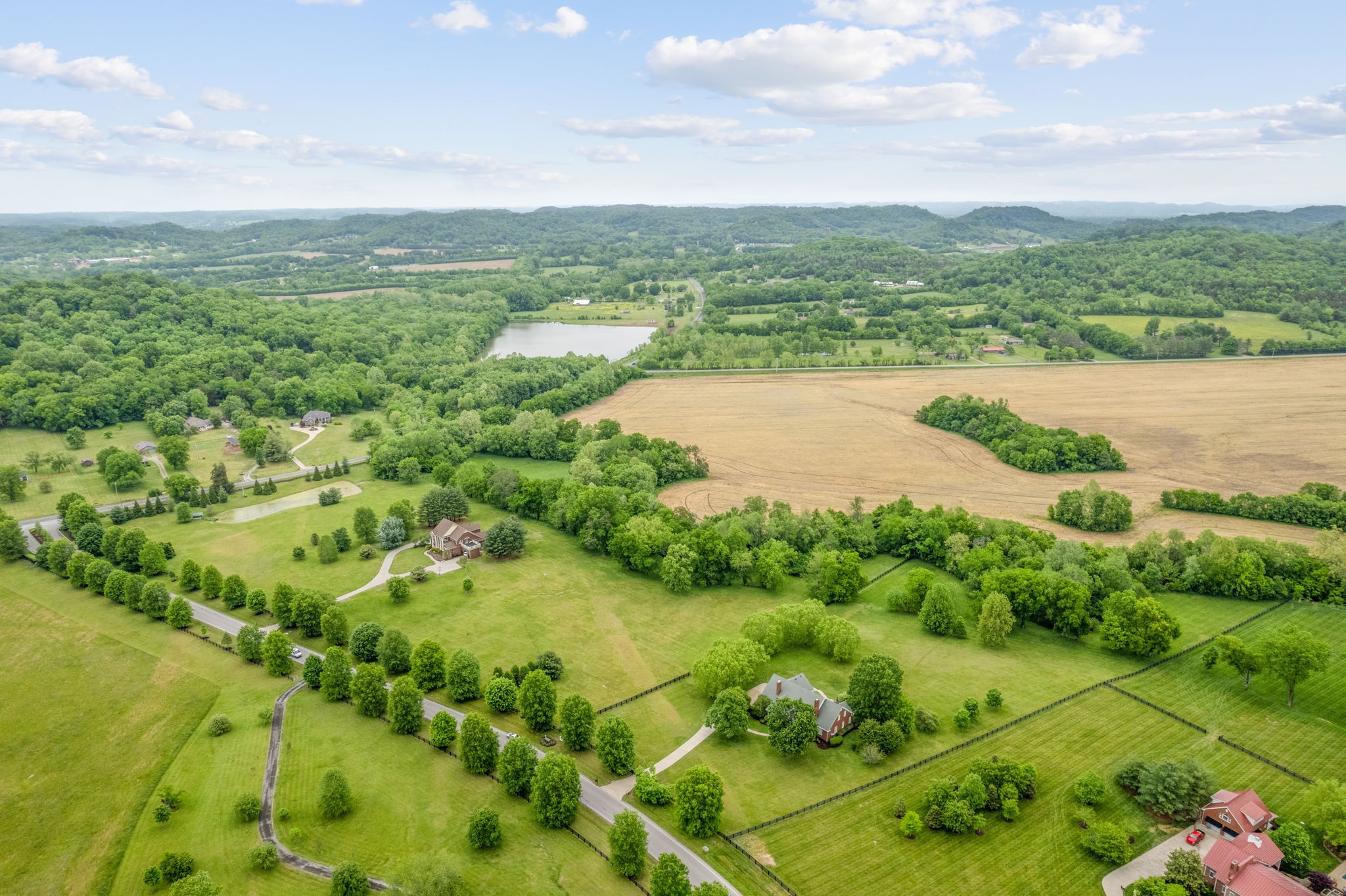 3210 Kinnard Springs Road Franklin, TN 37064 - Photo 64 of 64 a view of a lake with a city