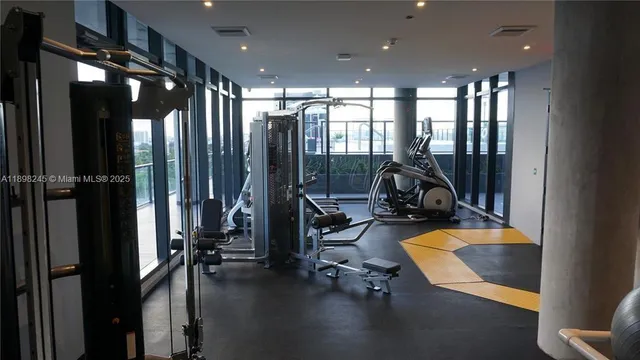a view of a room with gym equipment