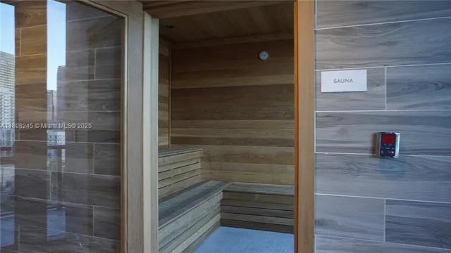 a view of a dining room with furniture and window