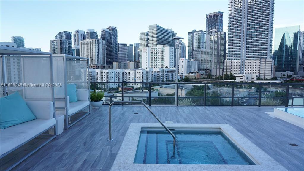 201 Southwest 17th Road, Unit 603 Miami, FL 33129 - Photo 22 of 23 a view of outdoor space with seating