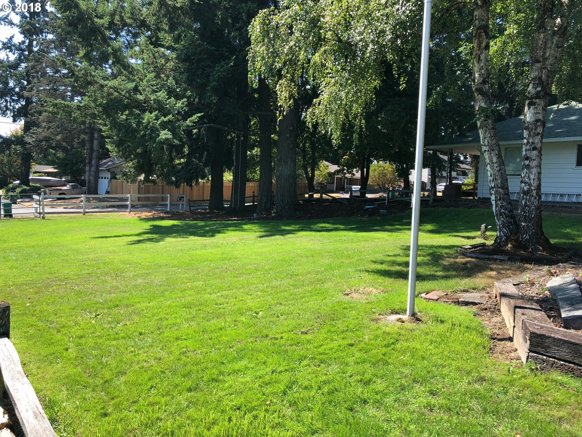 13275 Southwest Davies Road Beaverton, OR 97008 - Photo 15 of 22 a view of a patio with a table and chairs