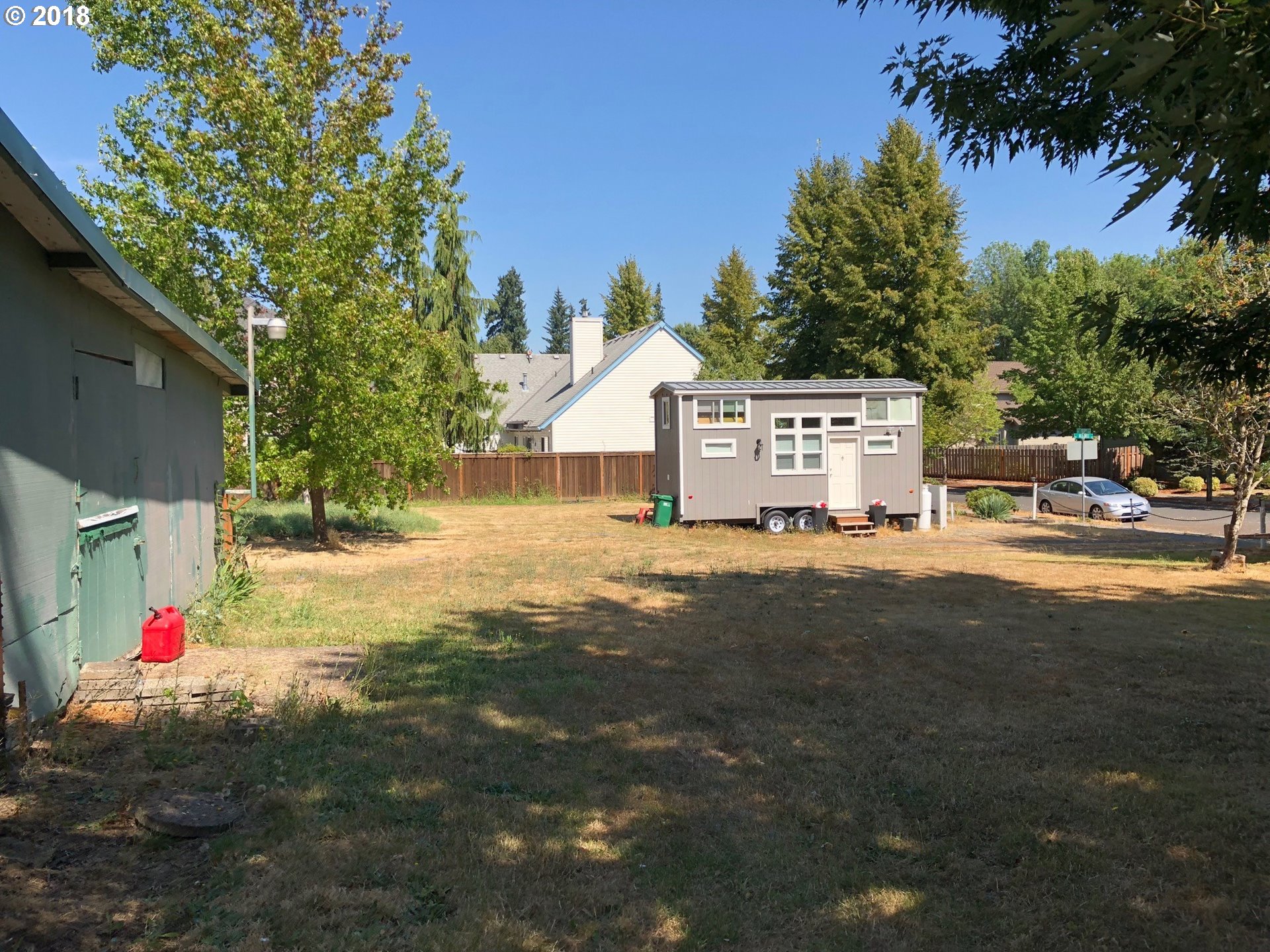 13275 Southwest Davies Road Beaverton, OR 97008 - Photo 19 of 22 a view of street with small houses