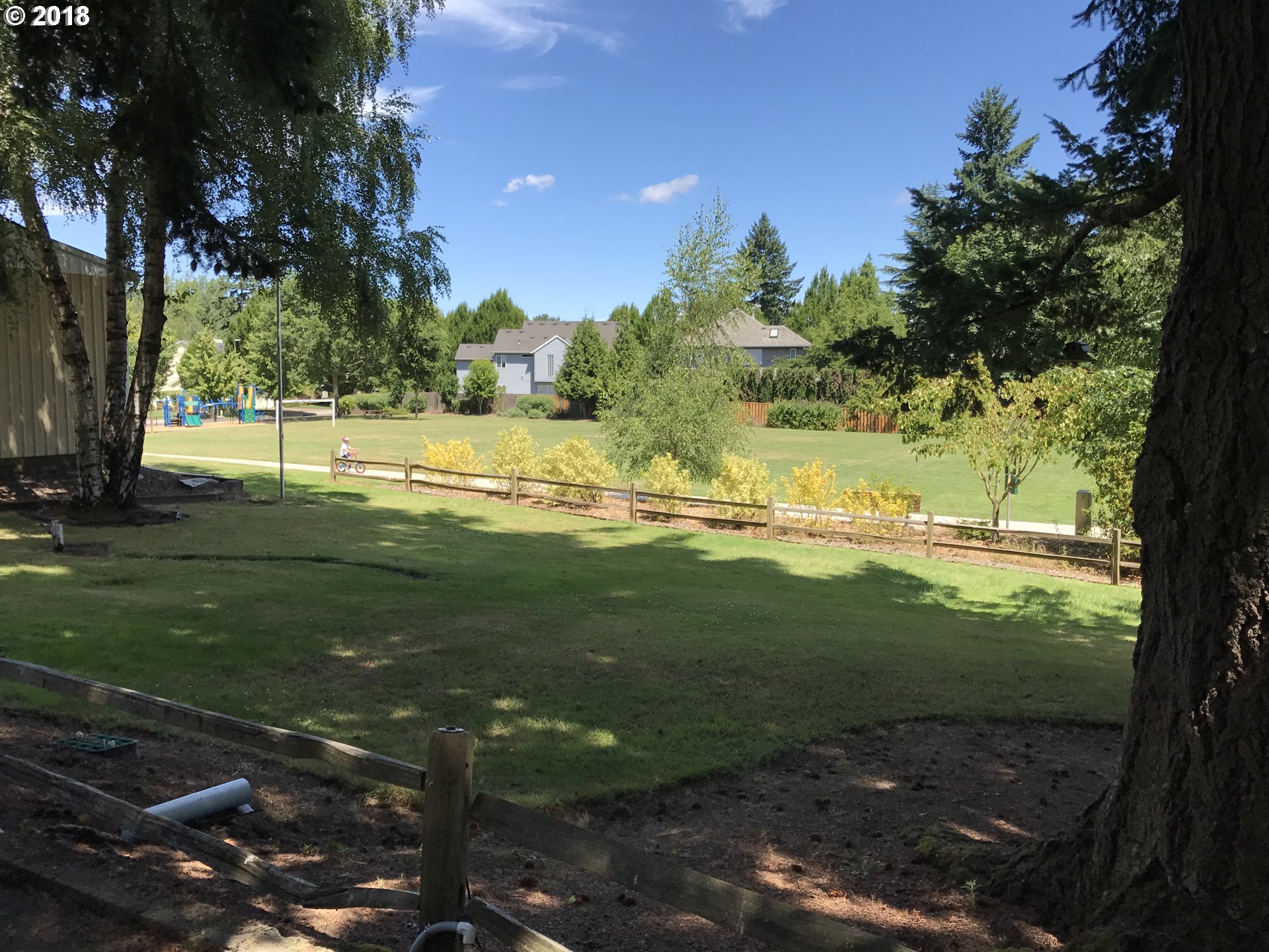 13275 Southwest Davies Road Beaverton, OR 97008 - Photo 5 of 22 a view of a golf course with a lake view