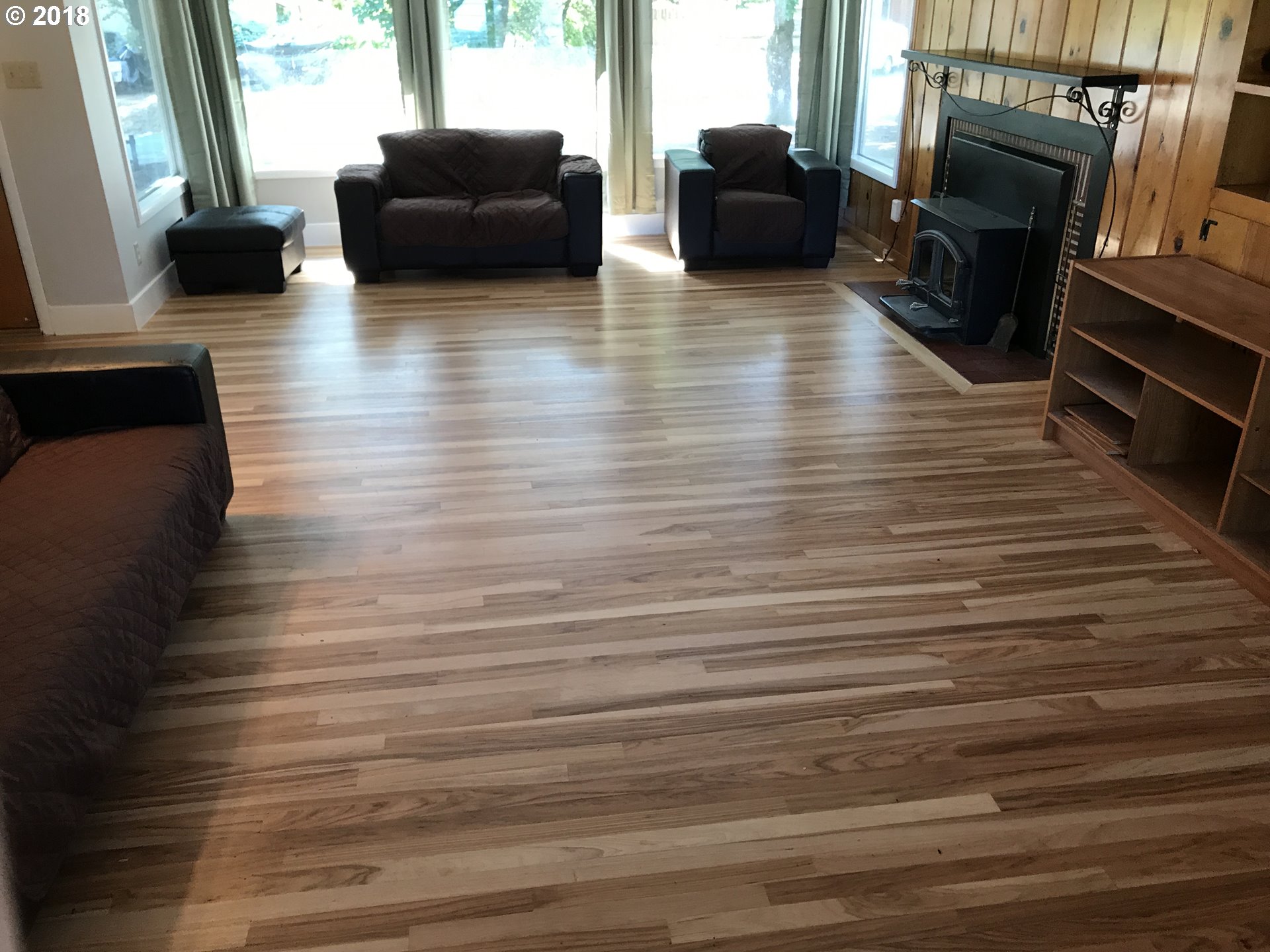 13275 Southwest Davies Road Beaverton, OR 97008 - Photo 8 of 22 a living room with furniture and a fireplace