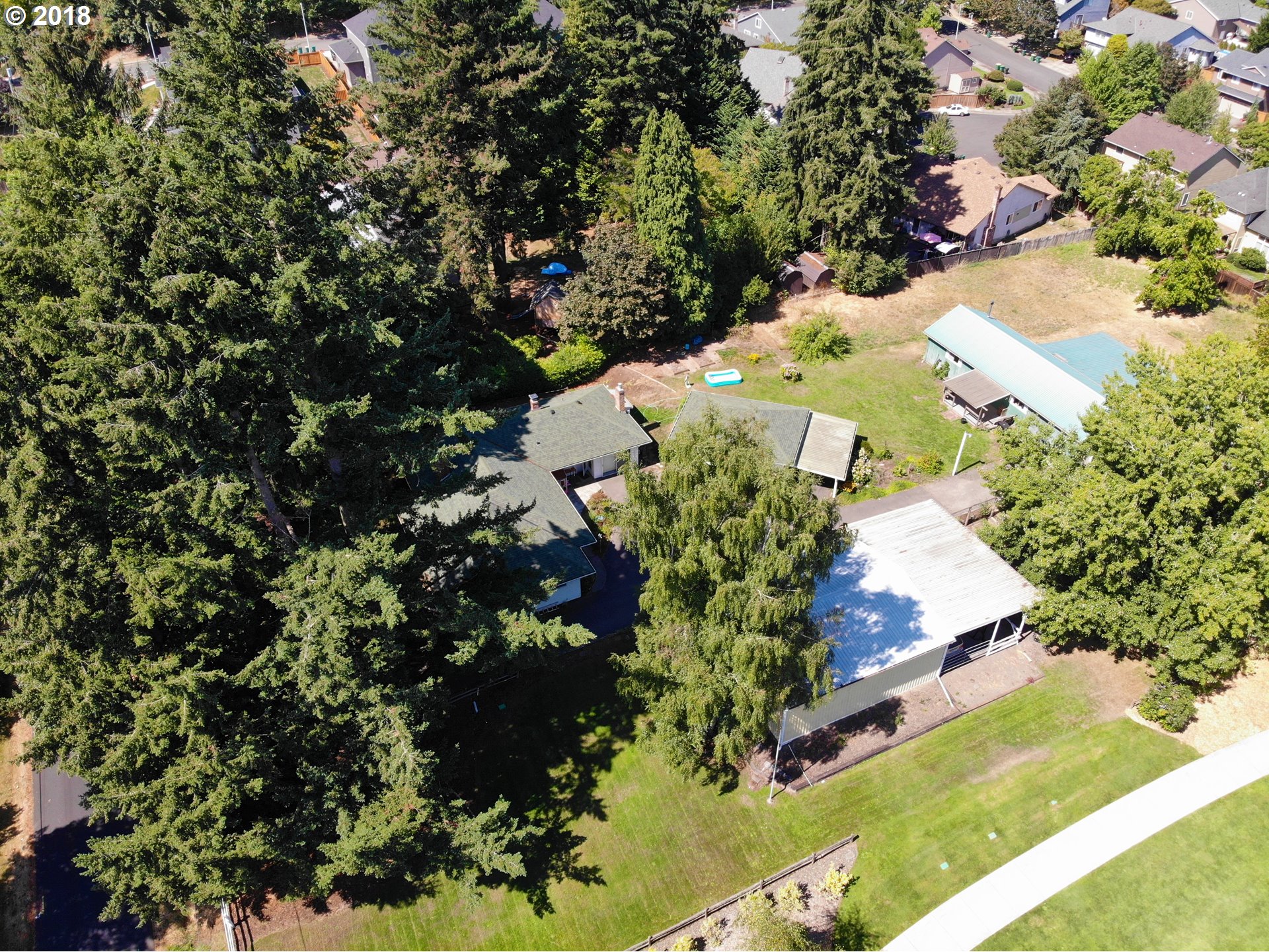 13275 Southwest Davies Road Beaverton, OR 97008 - Photo 10 of 22 an aerial view of a residential houses with outdoor space