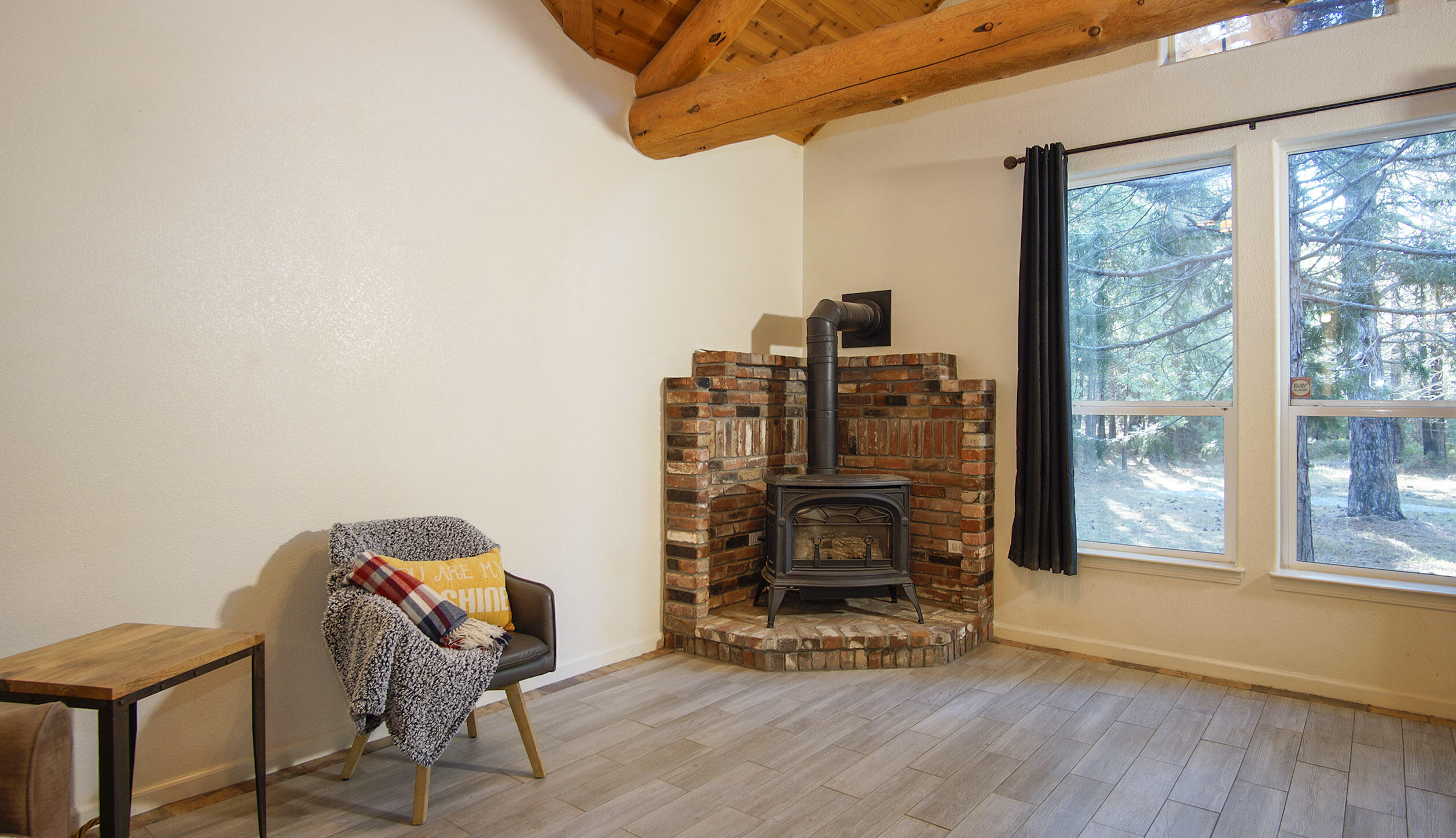 7911 Long Hay Flat Road Shingletown, CA 96088 - Photo 10 of 50 Living Room Woodstove View