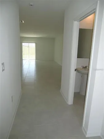 an empty room with a bathroom