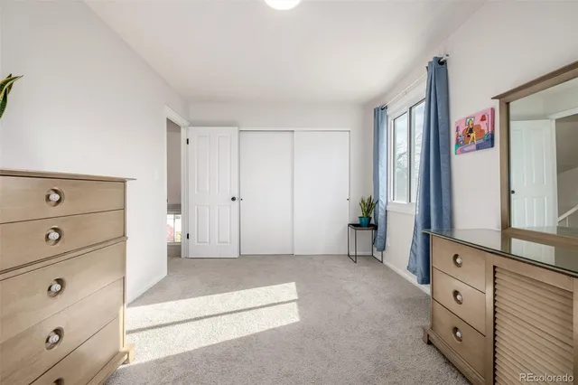 a view of room with cabinet and mirror