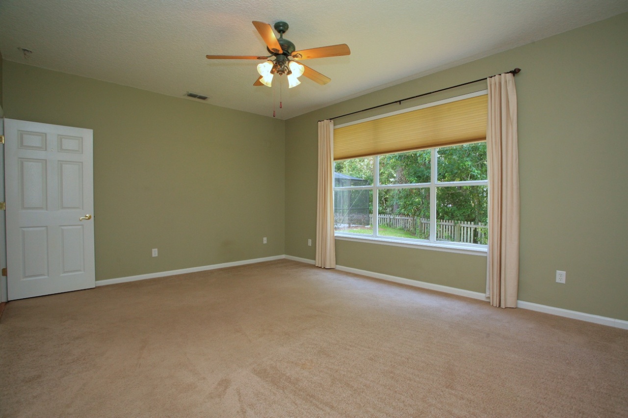 2536 Benjamin Road Jacksonville, FL 32223 - Photo 11 of 25 an empty room with a window