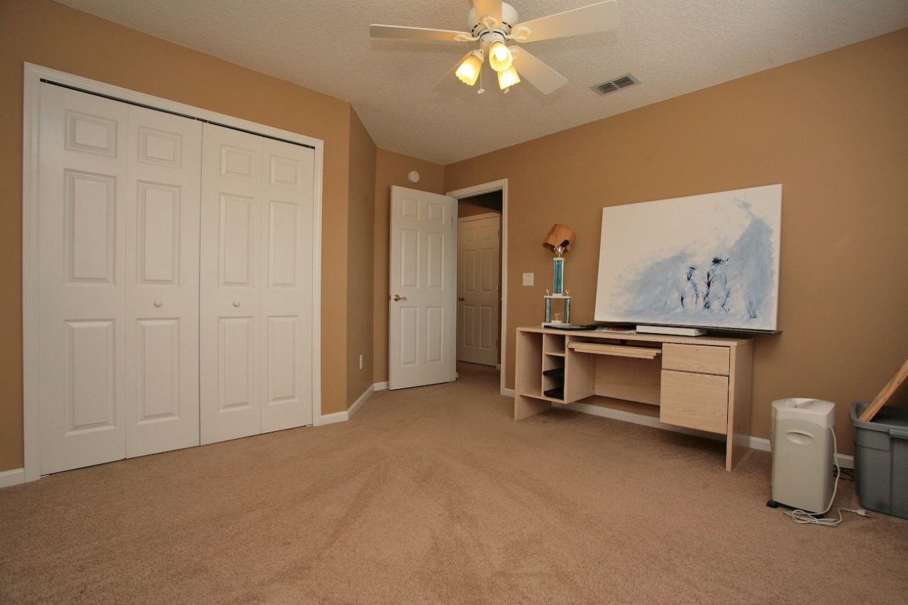 2536 Benjamin Road Jacksonville, FL 32223 - Photo 17 of 25 a view of a livingroom with furniture and a window