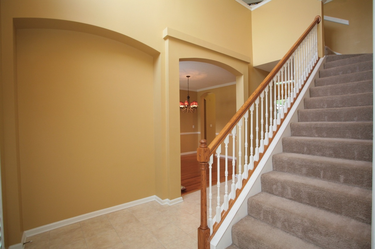 2536 Benjamin Road Jacksonville, FL 32223 - Photo 2 of 25 a view of staircase with wooden floor and next to a window