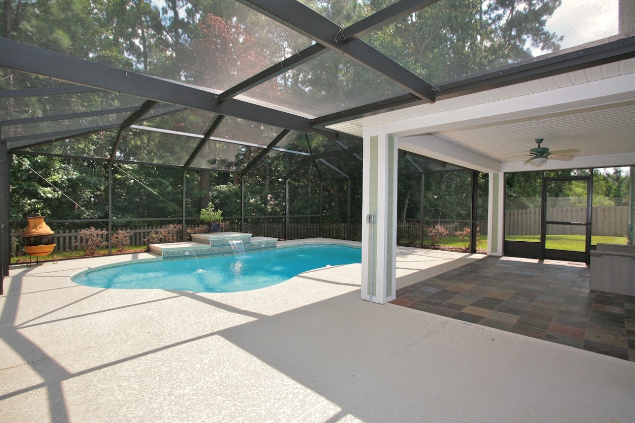 2536 Benjamin Road Jacksonville, FL 32223 - Photo 22 of 25 a view of a patio with a table and chairs
